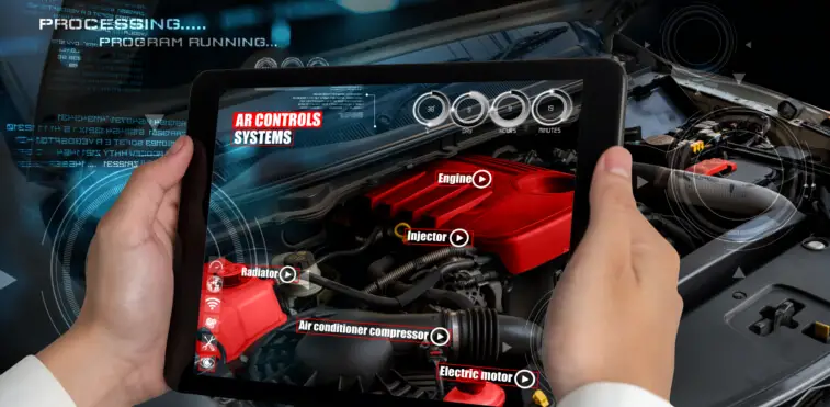 Figure 1 – A car mechanic using AI-powered software during car maintenance (Doctor, 2020). 